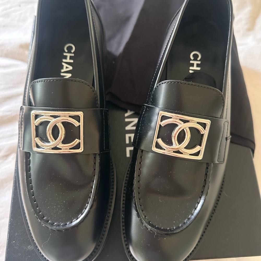 CHANEL Black Moccasin Platform Loafers with Silver Emblem - never been worn